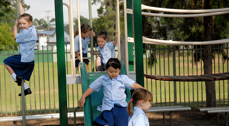 Old photo of St Bernadette's Catholic Primary School Lalor Park students on playgorund