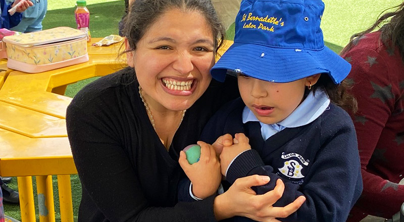 St Bernadette's Catholic Primary School Lalor Park smiling parent hugging child