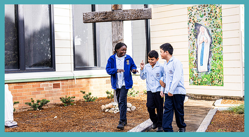 St Bernadette's Catholic Primary School Lalor Park students walking through campus