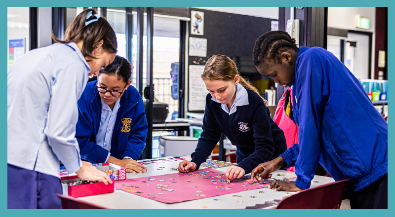 St Bernadette's Catholic Primary School Lalor Park student s completing a puzzle