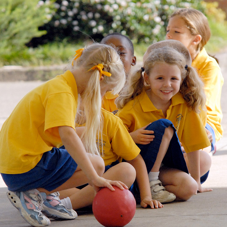 Old photo of St Bernadette's Catholic Primary School Lalor Park students playing athletic games