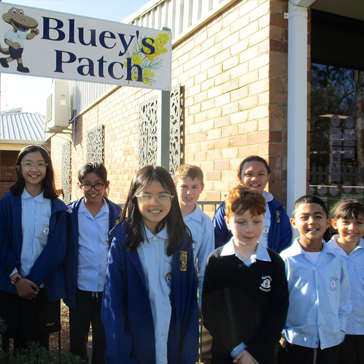 St Bernadette's Catholic Primary School Lalor Park students in front of Blueys Vegetable Patch