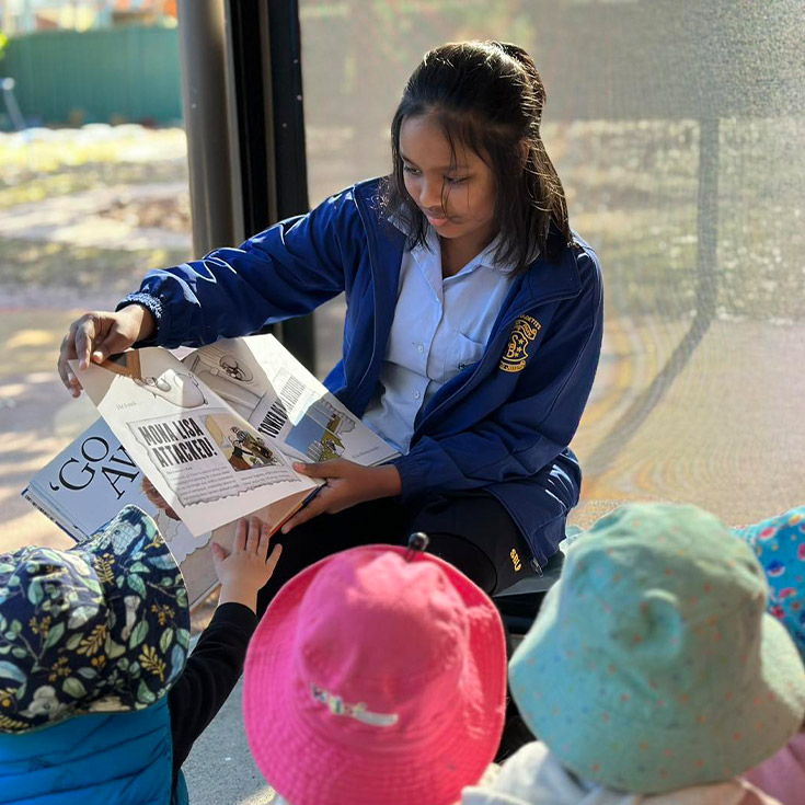 St Bernadette's Catholic Primary School Lalor Park students reading to preschoolers