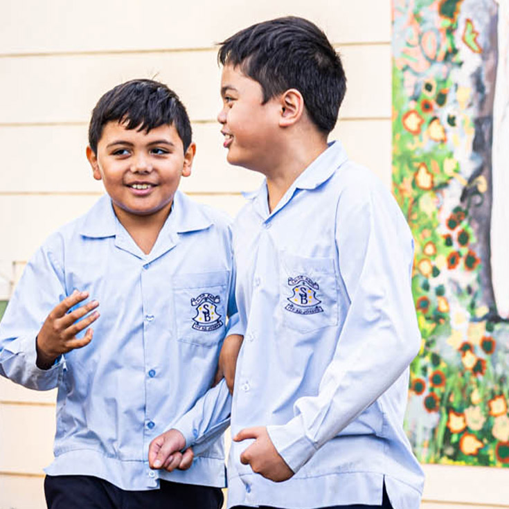 St Bernadette's Catholic Primary School Lalor Park students walking through campus