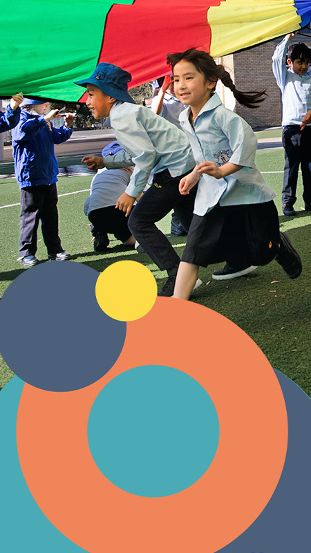 St Bernadette's Lalor Park students playing parachute