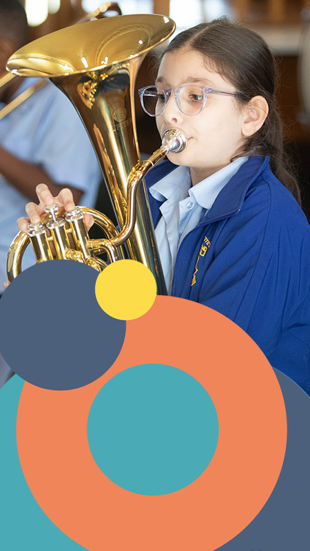 St Bernadette's Catholic Primary School Lalor Park student playing instrument in school band