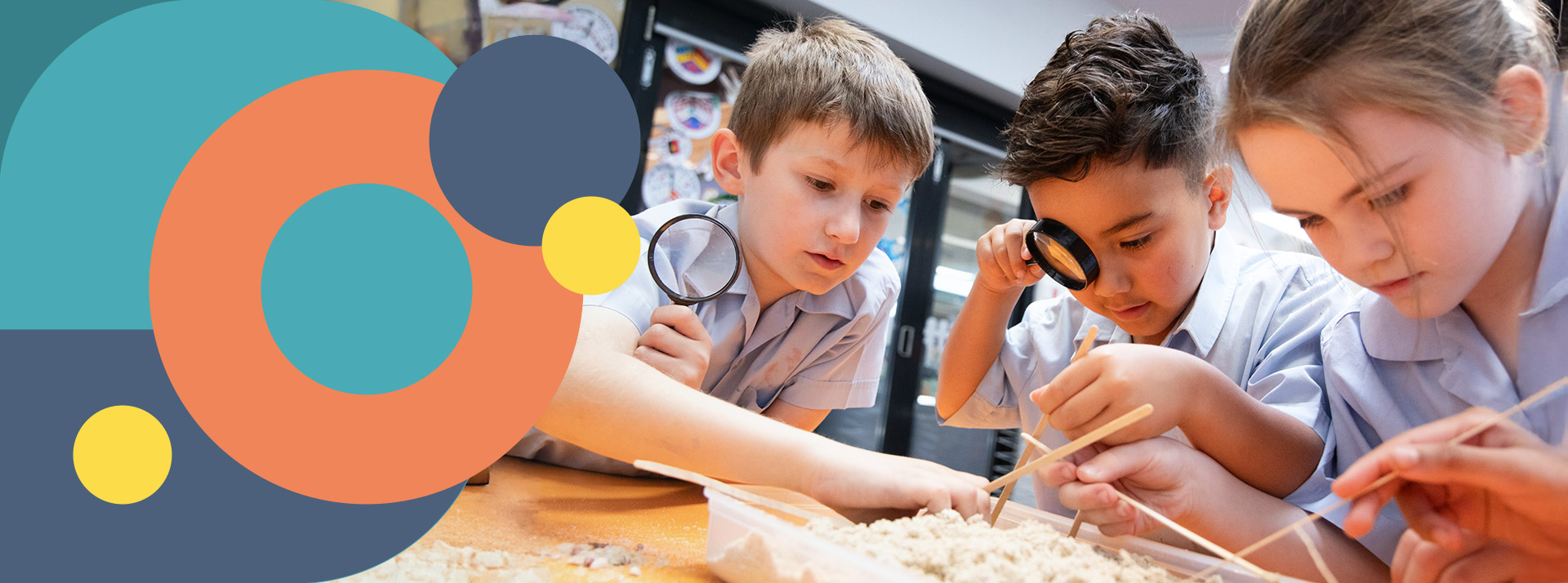 St Bernadette's Catholic Primary School Lalor Park students investigating with magnifying glasses