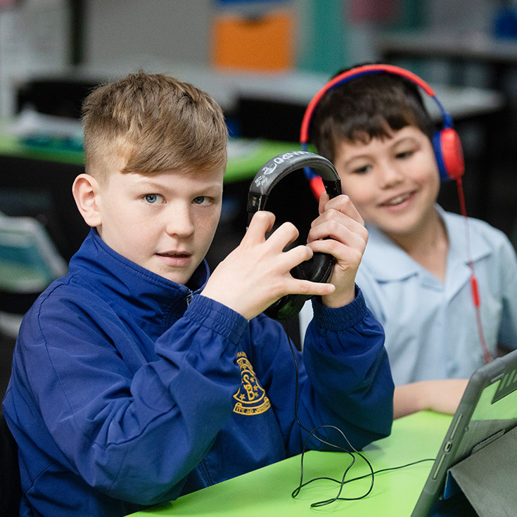 St Bernadette's Catholic Primary Lalor Park boys learning in class