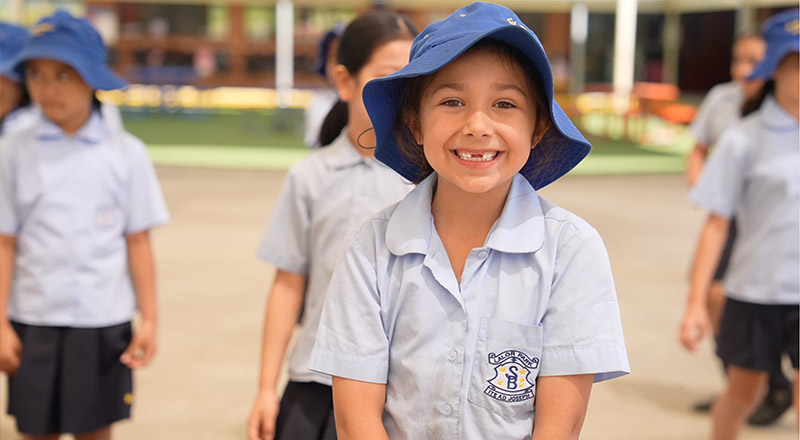 Happy students on school playground at St Bernadette's Lalor Park
